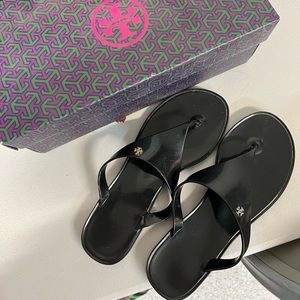 Tory black jelly slip ons